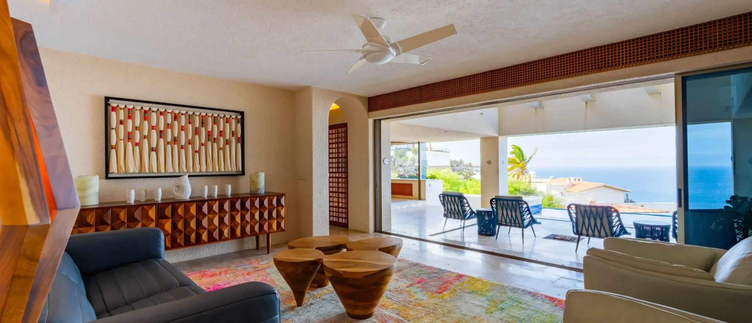 cabo-post-closing-costs-luxury-villa-living-terrace-featured