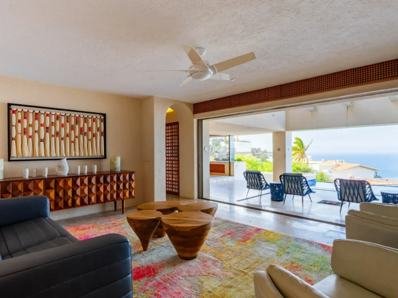 cabo-post-closing-costs-luxury-villa-living-terrace-featured