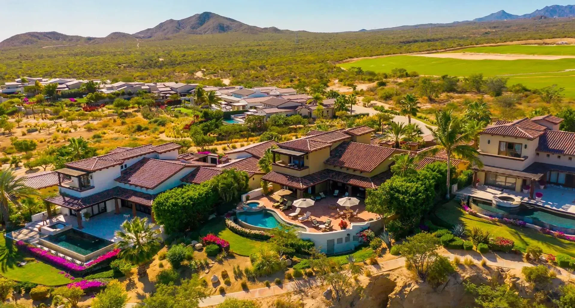 cabo-post-master-planned-querencia-homes-golf-aerial-featured